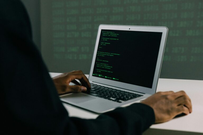 5-Cybersecurity-Predictions-for-2024-You-Should-Plan-For-scaled.jpg Free Person Using Macbook Air Stock Photo