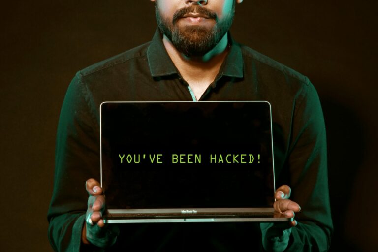 9-Signs-That-Your-Smart-Home-Device-Has-Been-Hacked-scaled.jpg Free Man Holding Laptop Computer With Both Hands Stock Photo