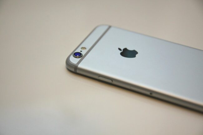 iPhone-Running-Slow-Speed-It-up-with-One-of-These-Tips-scaled.jpg Free Space Gray iPhone 6 Stock Photo