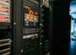 Rack of web servers with patch cables in a server room, illustrating the PHP2Shell vulnerability